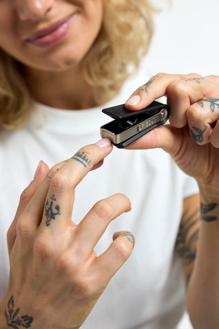 Woman cutting nails with EDJY