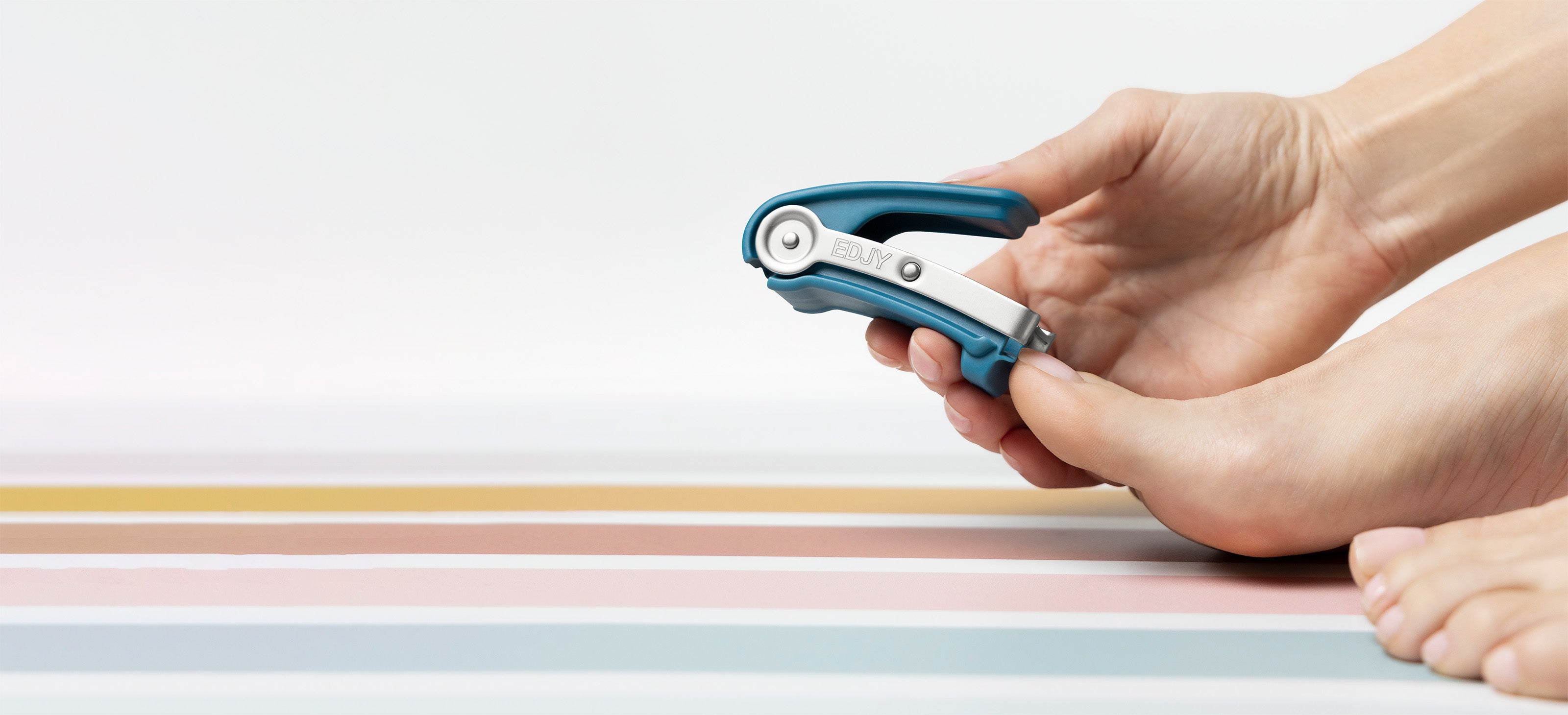 EDJY Toenail Cutter in use, making clean cuts on thick toenail.